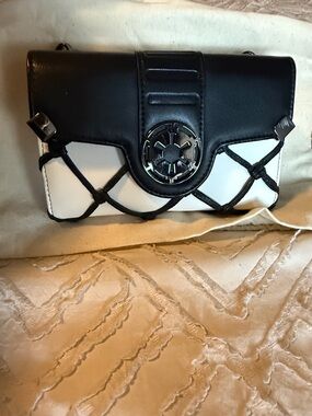 Black & White Women's Clutch with Silver Medallion Accent